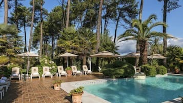 Indoor pool, outdoor pool, open 8:00 AM to 8:00 PM, pool umbrellas