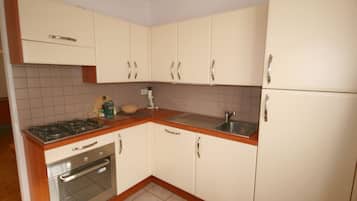 Apartment | Private kitchenette | Fridge, microwave, oven, stovetop