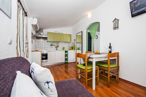 Apartment Studio Garden with patio | Wohnbereich