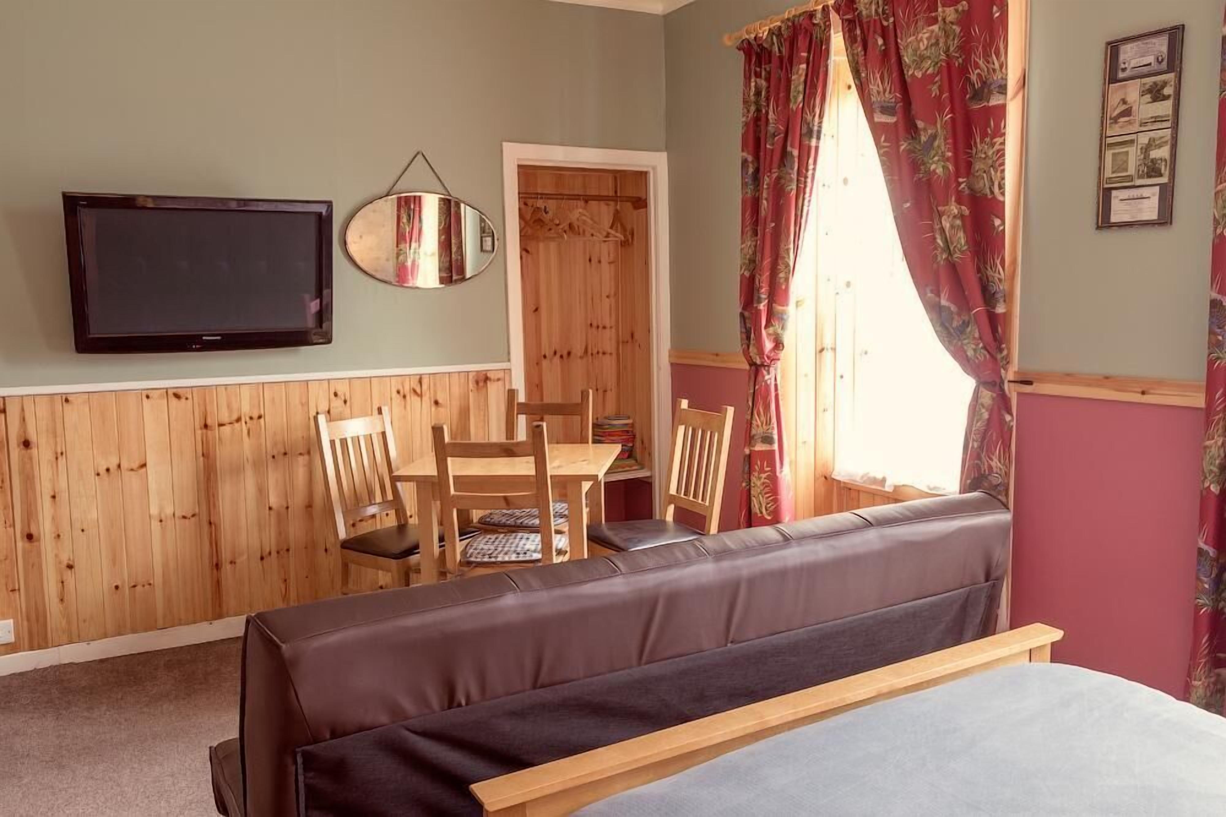 Family Room, Multiple Beds, Ensuite | Desk, blackout curtains, iron/ironing board, free WiFi