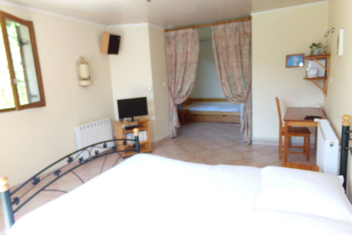 Classic Triple Room, Multiple Beds, Non Smoking | Individually decorated, individually furnished, desk, blackout drapes