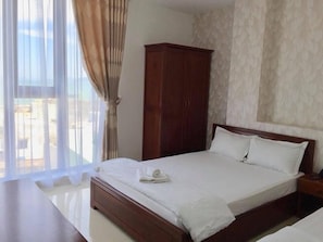 Phòng 3, quang cảnh biển | Minibar, bàn, phòng cách âm, truy cập Internet không dây miễn phí 