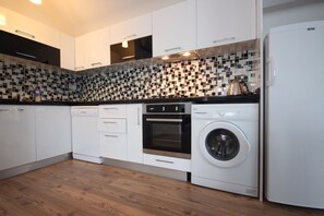 Duplex, 2 Bedrooms | Private kitchenette | Fridge, oven, stovetop, dishwasher