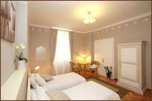 Chambre double ou avec lits jumeaux, non-fumeur, salle de bains commune (Tulipano) | Accès au Wi-Fi (inclus), literie fournie