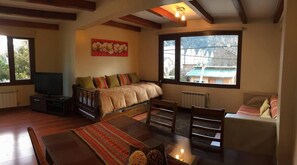 Flat-screen TV - Abedul Apartamentos (San Martín de los Andes)