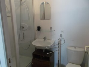 Shower, free toiletries, hair dryer, towels