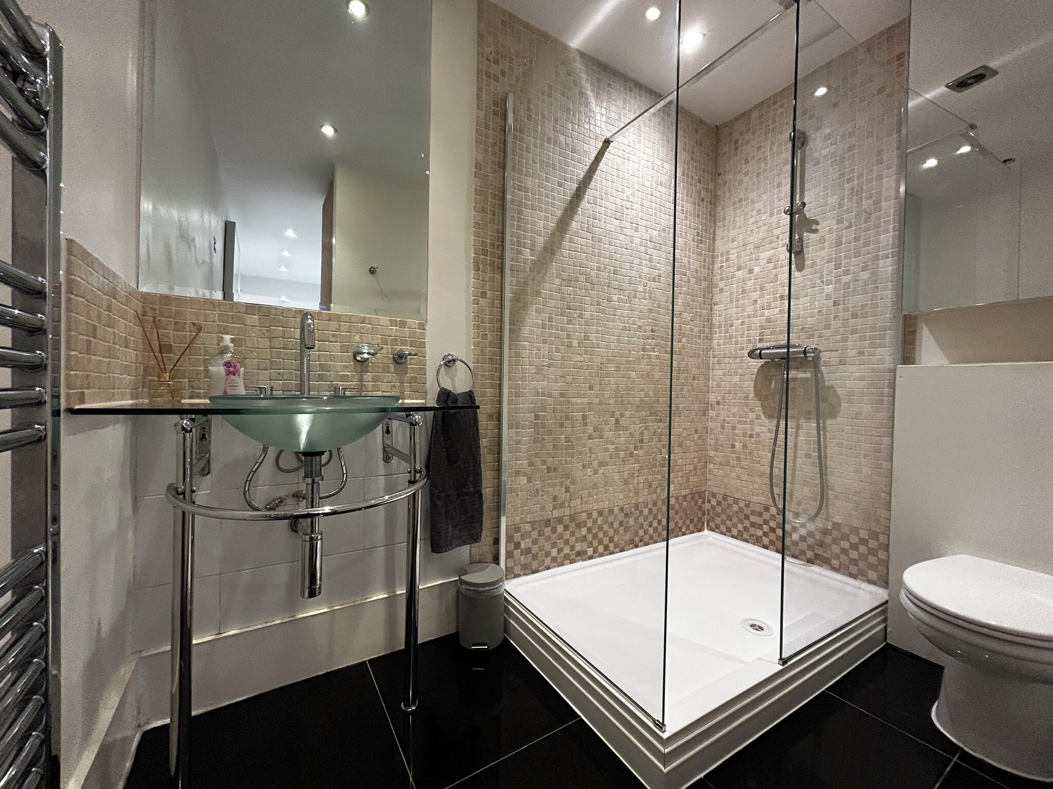Combined shower/tub, hair dryer, towels, soap