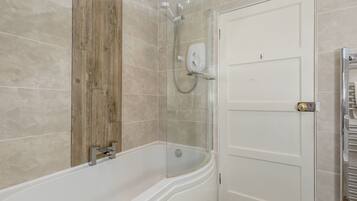 Combined shower/tub, hair dryer