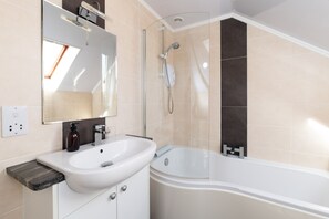 Combined shower/bathtub, hair dryer