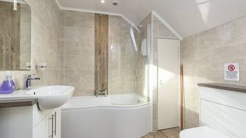 Combined shower/tub, hair dryer