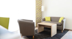Junior Apartment | Living area - ADAPT APARTMENT HOTEL Giessen (Giessen)