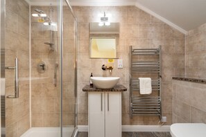 Combined shower/tub, hair dryer