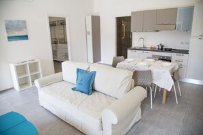 Flat-screen TV - Rivabella Suite Apartments (Rimini)