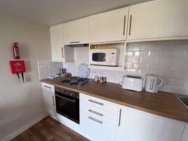 Apartamento superior, 1 cama de casal e sofá-cama, suíte, vista para o vale (Beacon View) | Cozinha privada | Cafeteira/chaleira, chaleira elétrica
