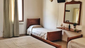 Desk, blackout curtains, free WiFi, bed sheets