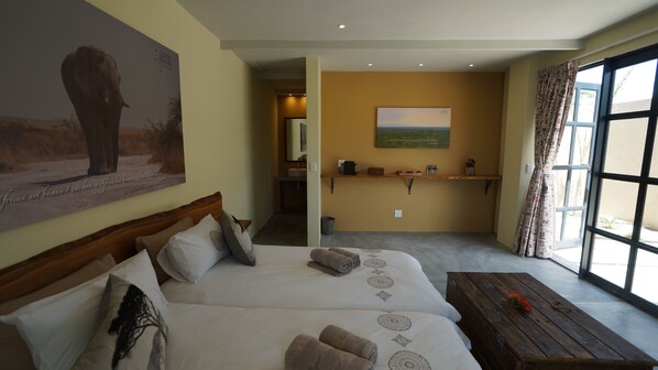 Habitación Deluxe con 1 cama matrimonial o 2 individuales, 1 habitación, patio | Sábanas de algodón egipcio y ropa de cama de alta calidad 