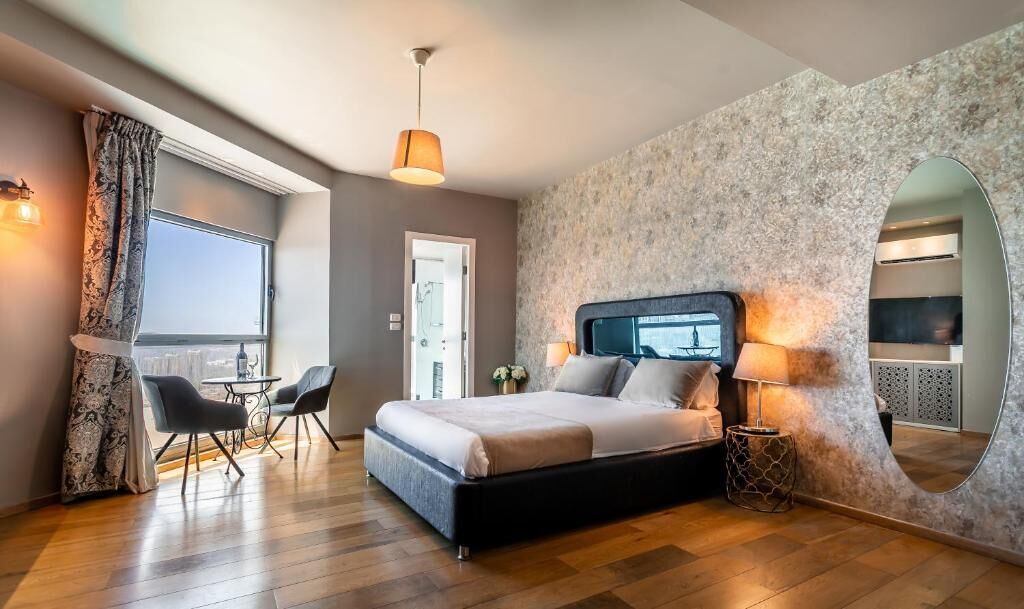 Superior Quadruple Room, City View | Desk, laptop workspace, soundproofing, iron/ironing board (on request)