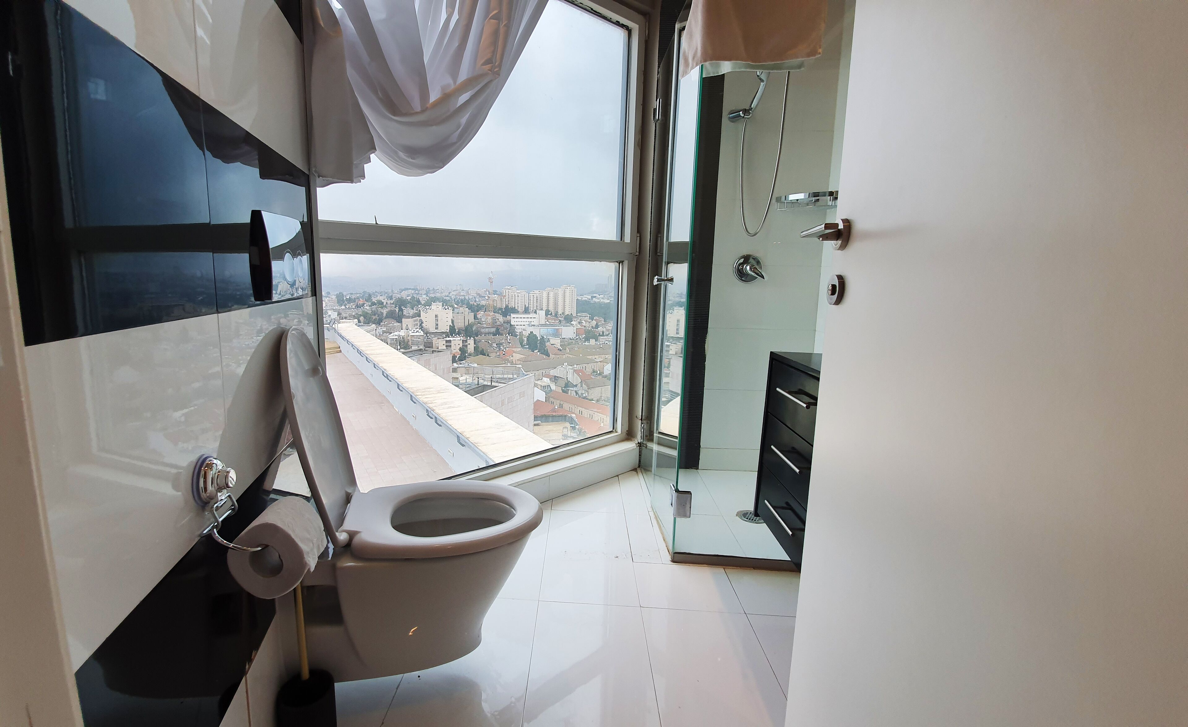 superior quadruple room, city view | bathroom | shower, free toiletries, hair dryer, towels