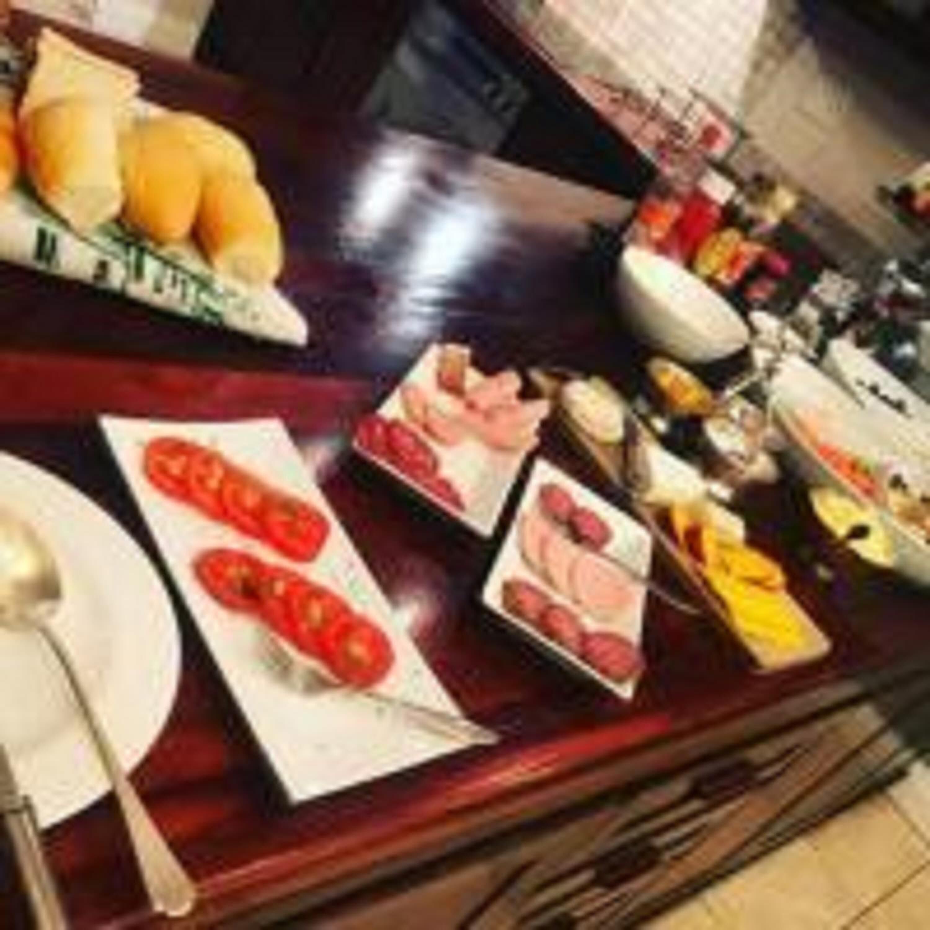 A bar area with various food items and condiments.