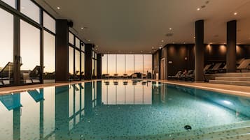 Indoor pool, outdoor pool, pool umbrellas, pool loungers