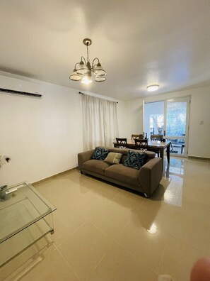 Apartment, 4 Bedrooms, Non Smoking | Living area | 32-inch LED TV with digital channels, Netflix, Hulu - Placid Suites (San Juan)