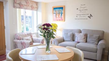 Cottage Mewah, 1 kamar tidur, pemandangan kebun | Area keluarga | TV layar datar, pemutar DVD, dan lantai berpemanas