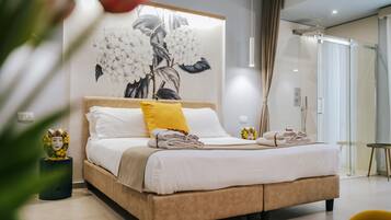 Suíte júnior | 1 quarto, lençóis italianos Frette, roupas de cama premium