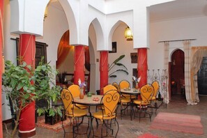 Breakfast, lunch, dinner served; local cuisine 