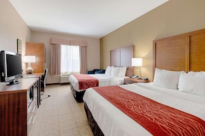 A hotel room with two beds, a desk with a television, and a chair. - Comfort Inn and Suites (Fredericksburg)