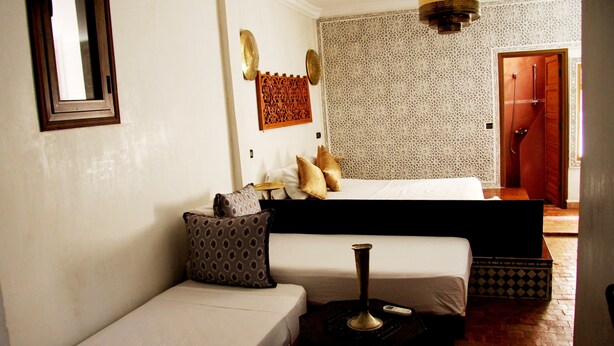 Triple Room | Desk, blackout drapes, WiFi (free), bed sheets