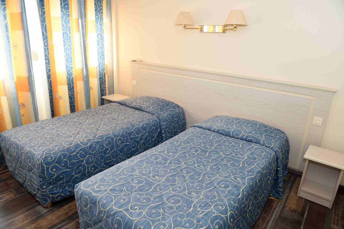 Blackout curtains, soundproofing, free WiFi, bed sheets