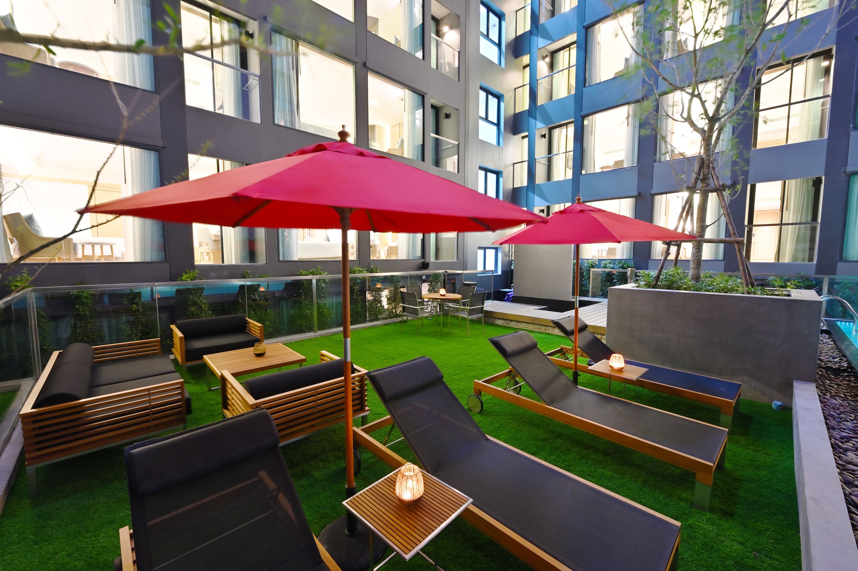 outdoor pool, pool umbrellas, pool loungers