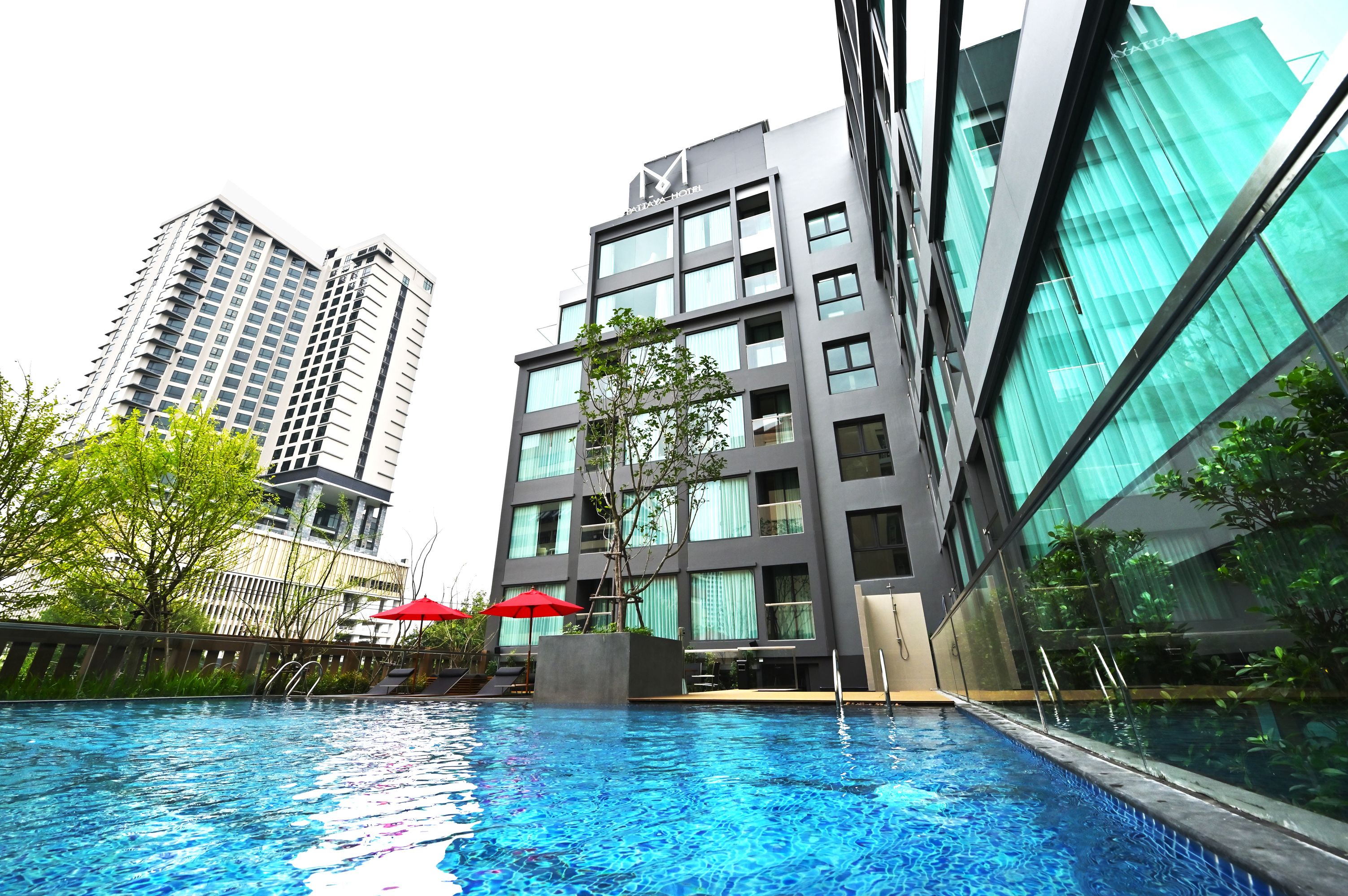 outdoor pool, pool umbrellas, pool loungers