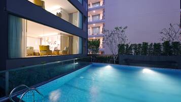 Outdoor pool, pool umbrellas, pool loungers
