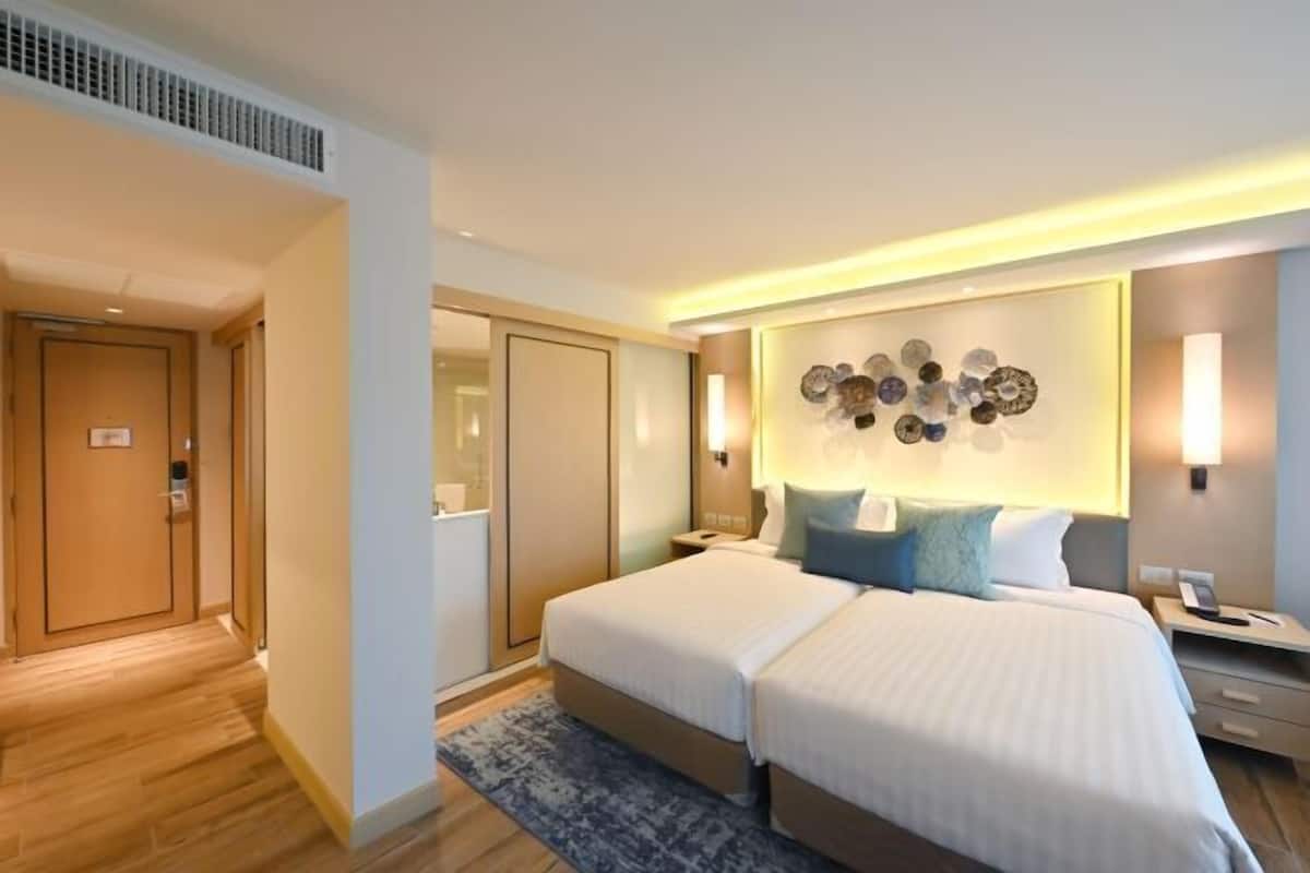 Free minibar items, in-room safe, desk, blackout curtains