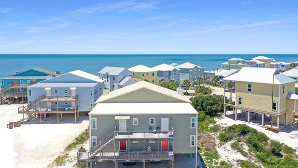 A beachfront hotel with multiple-story buildings, balconies, and a view of the ocean. - Lots of Space, Beachview, Easy ~ Coastal Sunshine (Cape San Blas)
