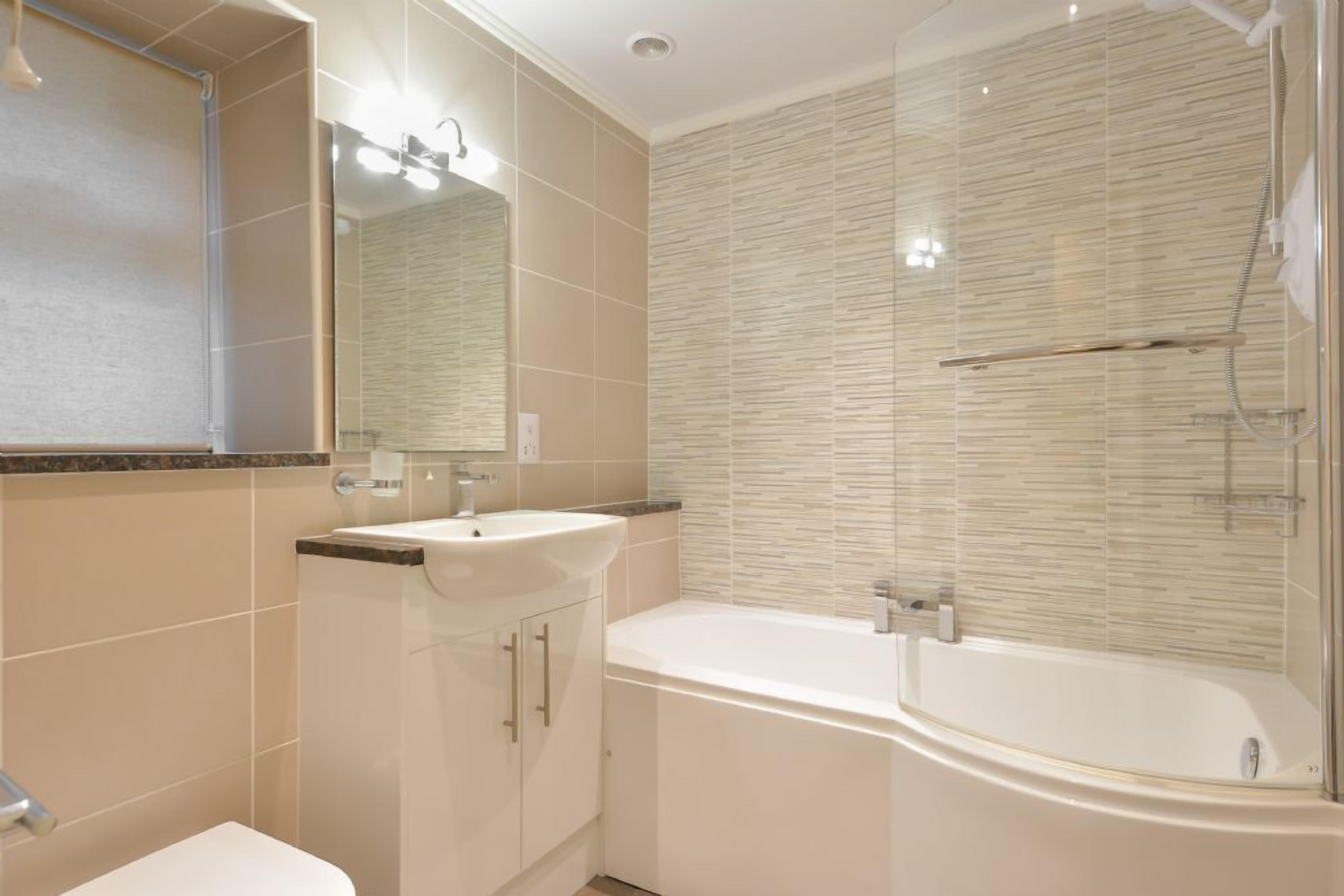 Combined shower/tub, hair dryer