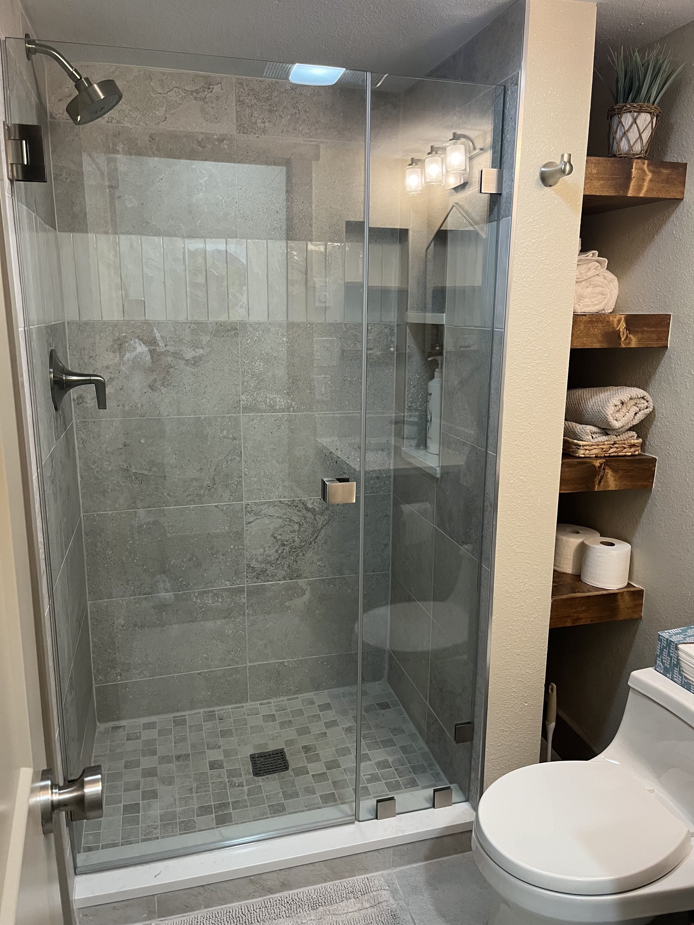 Combined shower/tub, hair dryer, towels, soap