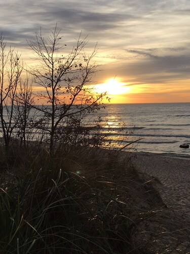 Beautiful home in Picturesque setting just steps from Lake Michigan!