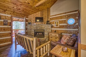 Cabin, 1 King Bed, Hot Tub | Living area | TV, fireplace, DVD player