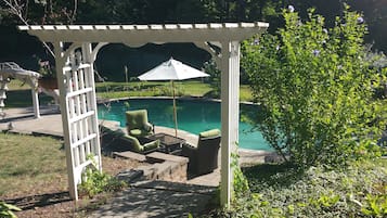 Seasonal outdoor pool, pool umbrellas, pool loungers