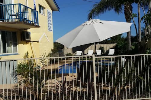 Indoor pool, open 9 AM to 8:30 PM, pool loungers