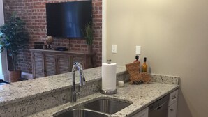 Coffee/tea maker, fridge, microwave, oven - Historic Times-Picayune Building: Condo with Private Balcony in Downtown NOLA (New Orleans)