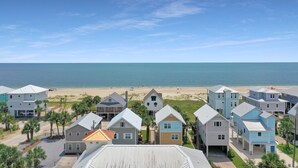 A beachfront residential area with houses, a beach, and the ocean. - Gulf View, Large Home with Elevator, and Easy Beach Access ~ Sammys Old Place (Indian Pass)
