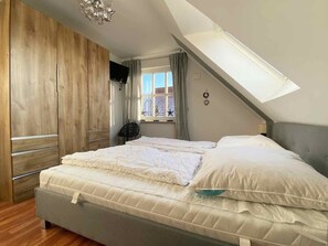 4 slaapkamers, een strijkplank/strijkijzer, gratis wifi