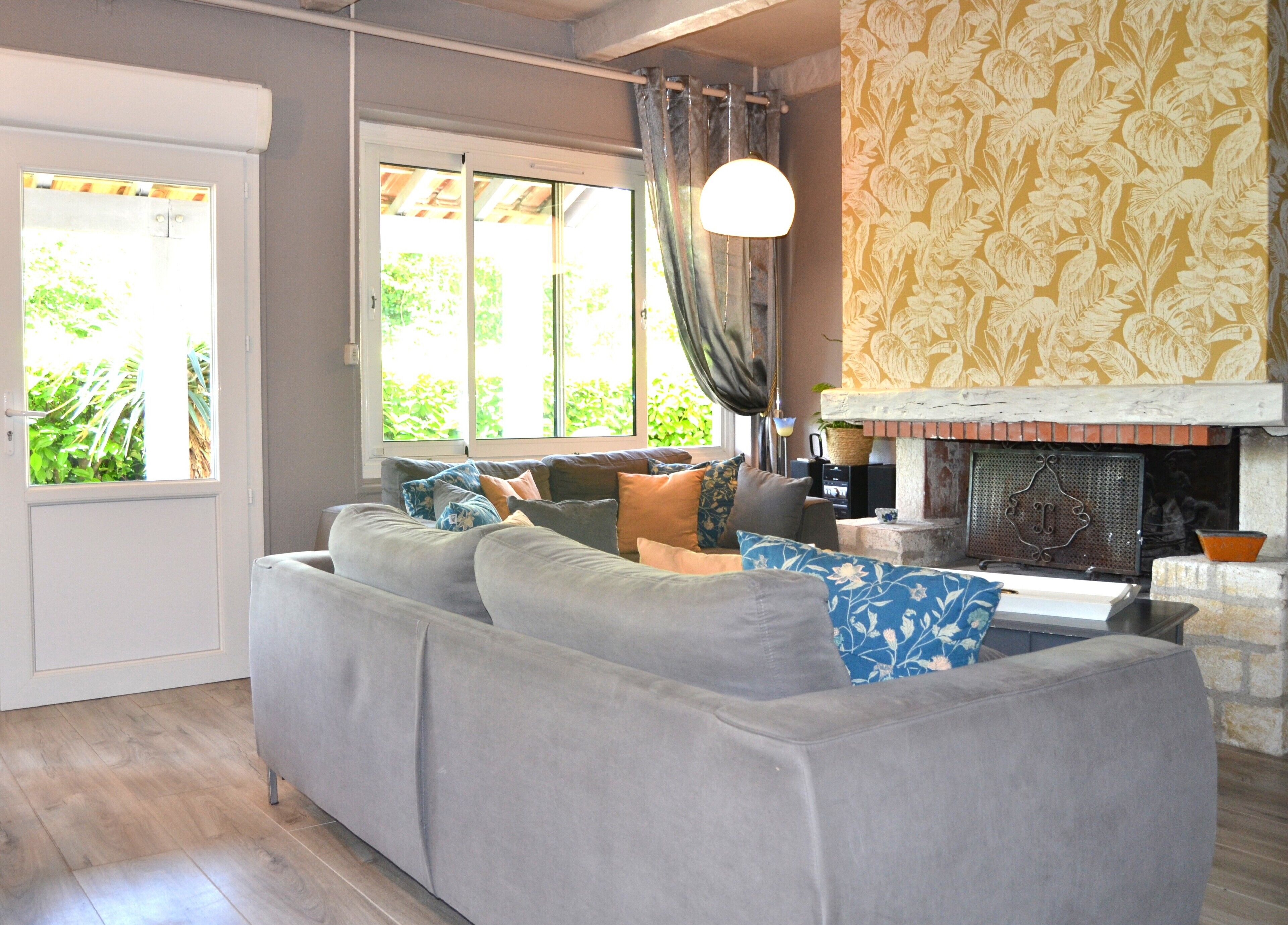 TV, fireplace, books