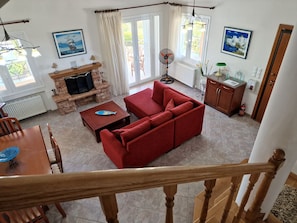 Smart TV, fireplace, DVD player, books