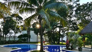 Outdoor pool, open 6 AM to 9:30 PM, pool loungers - Chalet 21 (Playa del Carmen)
