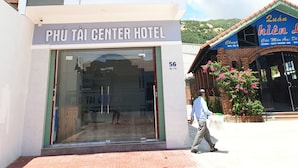 A two-story building with a sign reading "PHU TAI CENTER HOTEL". - Phu Tai Center Hotel (Quy Nhon Tay)