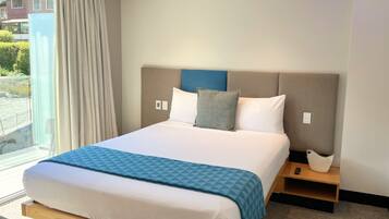 Queen Room With Balcony | Premium bedding, in-room safe, individually furnished, desk